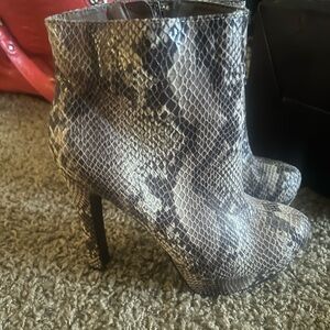 Snake print boot. Only worn once.